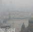 昨天，雾霾天气造成市区能见度下降，建筑物在雾霾中若隐若现。 - 新浪黑龙江