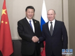 6月8日，国家主席习近平在阿斯塔纳会见俄罗斯总统普京。 新华社记者兰红光 摄 - 哈尔滨新闻网