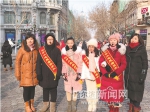 中小学生走上街头 倡导文明旅游 - 哈尔滨新闻网