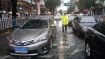 晚高峰暴雨突袭 哈市交警部门1700余名警力疏导交通 - 新浪黑龙江